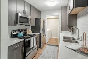 our apartments have a modern kitchen with stainless steel appliances  at Parkwest Apartment Homes, Hattiesburg, MS