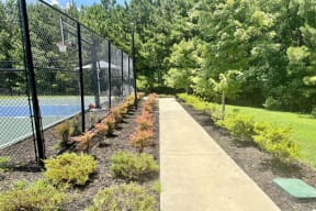 Scenic Tennis Court Entrance at Reserve at Park Place Apartment Homes, Hattiesburg, MS, 39402