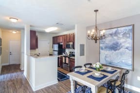 Dining Room and Kitchen View at Charleston Apartment Homes, Alabama, 36695