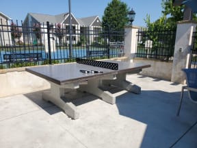 a ping pong table in front of a pool at Reserve of Bossier City Apartment Homes, Bossier City, LA, 71111