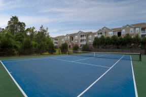 Tennis court  at Charleston Apartment Homes, Alabama