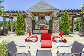 a patio with chairs and a fire pit at Century Lakeshore Crossings, Birmingham Alabama