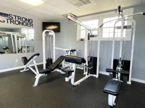 Fitness center with equipment at Barracks West in Charlottesville, VA