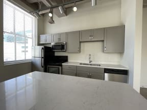 Land Bank Lofts in Columbia, SC with modern kitchen and spacious windows
