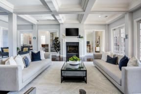 a living room with two couches and a table at Century Lakeshore Crossings, Birmingham, AL 35211