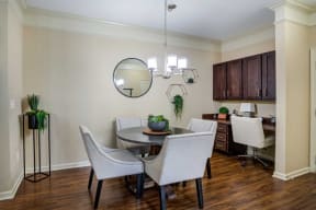 a dining room with a table and chairs at Century Lakeshore Crossings, Birmingham, AL 35211