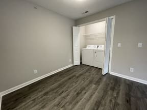 Stone Gate Apartments in Charlotte, NC renovated apartment with hardwood-style floorings