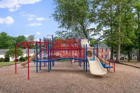 Playground with play area and slide at Barracks West in Charlottesville, VA