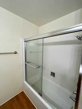Shower doors and tub Exterior of the building with lots of Greenery Prodesse Property Group 418 Brahms Way Sunnyvale CA 94087