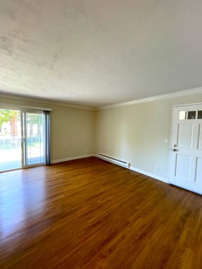 Living Room entrance with patio door Exterior of the building with lots of Greenery Prodesse Property Group 418 Brahms Way Sunnyvale CA 94087