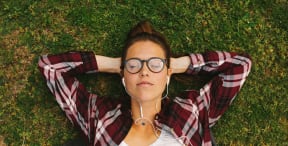 girl laying in quad