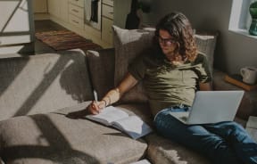 student studying on couch