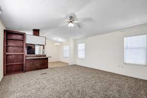 An Empty Living Room at Buckingham Village Apartments, Universal City, TX