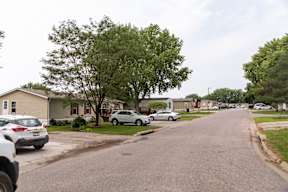 Clean neighborhood and street at Maple Grove, Nebraska, 68521