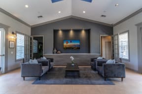 a large living room with couches and a coffee table