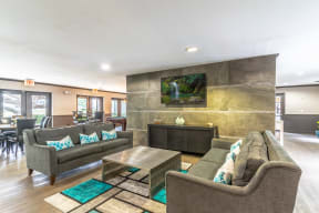 clubhouse area with couches and tv