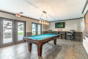 Clubhouse area with pool table and tv