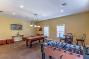 Clubhouse area with pool table and table top soccer