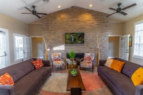 clubhouse area with couches and tv