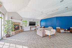 Living Room with Fireplace at Four Winds Apartments, Massachusetts