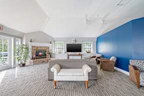 Living room with grey couch at Four Winds Apartments, Fall River, 02720