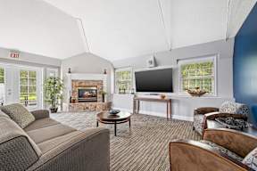 Living room with Television at Four Winds Apartments, Fall River