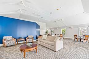 Spacious Living Room with couch at Four Winds Apartments, Massachusetts
