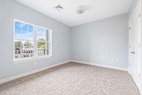 Empty room with window at Four Winds Apartments, Massachusetts, 02720