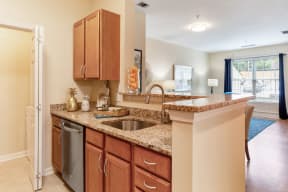 a kitchen with a counter top and a sink