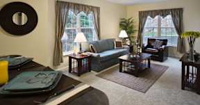 a living room with a couch and a table