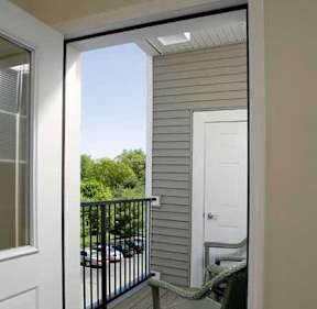 a view of a balcony from a door