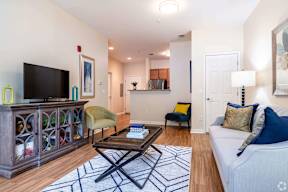 a living room with a couch and a tv