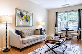 a living room with a couch and a coffee table