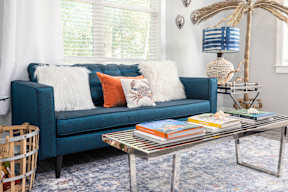 Living Room with Blue Couch at Park Circle Village Apartments, North Charleston, 29405