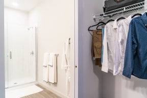 a walk in closet in a 555 waverly unit