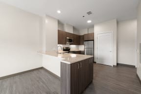 a kitchen with a granite counter top and