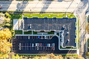 A parking lot with a large number of parking spaces.