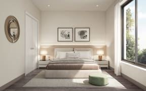 a bedroom with a bed and a window