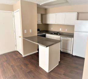 Kitchen With White Cabinetry And Appliances at Baker Station, Antioch, Tennessee