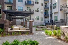 the residences at city center clubhouse patio and seating area
