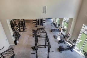 an overhead view of a gym with weights and cardio equipment