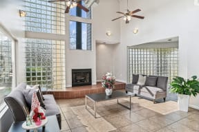 Living room with couches and a fireplace  at Wellington Farms, Charlotte, NC, 28212