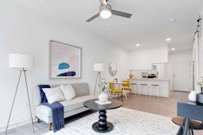 a living room with a couch and a table