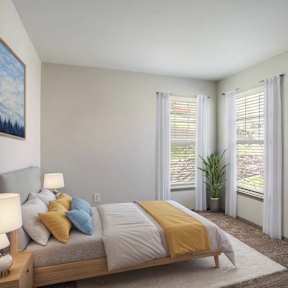 A bedroom with a bed, pillows, a lamp, and a painting on the wall.