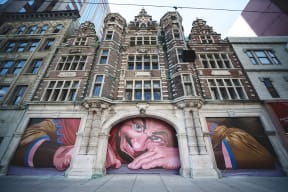 a large mural on the side of a building