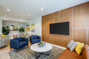 a living room with a couch and a table