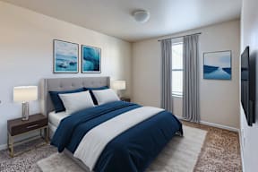A bedroom with a large bed and a television on the wall.