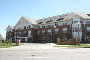 a large building with a street in front of it