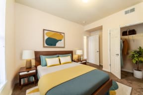a bedroom with a bed and a closet