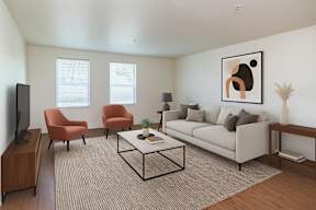 A living room with a couch, chairs, and a television.